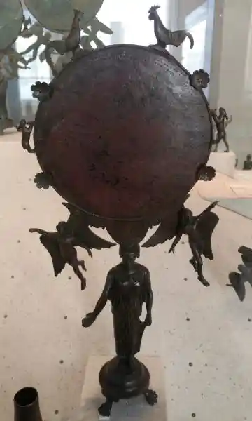 Circular mirror with two angels